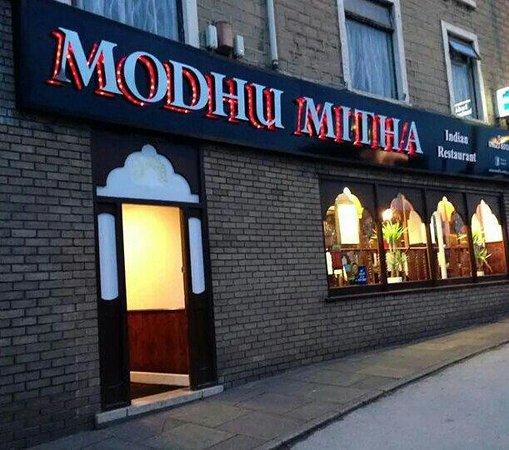modhu mitha